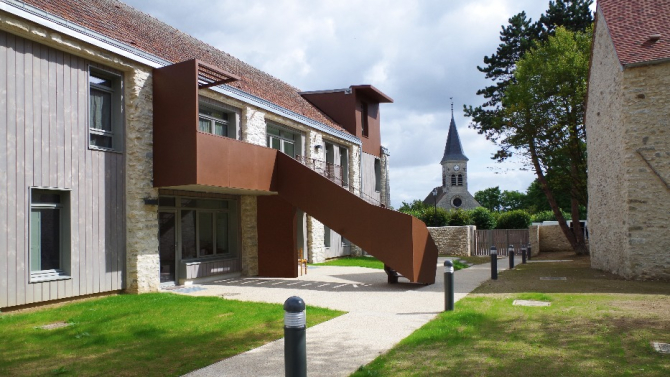 Reconversion d'une ferme en 15 logements sociaux