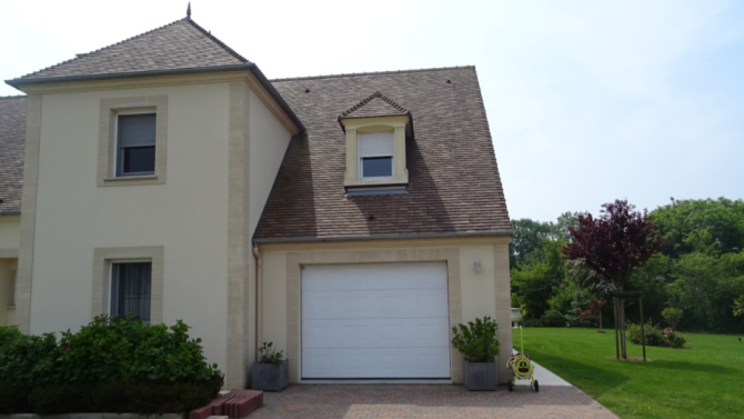 Extention d'une habitation avec garages, atelier et grenier supplémentaires